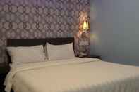 Bedroom Hotel Q Inn