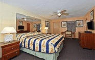 Bedroom 5 American Inn and Suites
