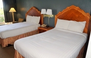 Bedroom 6 Hotel Elev8 (ex Econo Lodge)