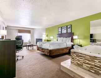 Bedroom 2 Sleep Inn & Suites near Sports World Blvd