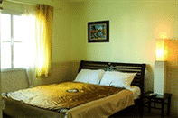 Phòng ngủ Bupatara Hotel