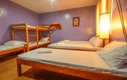 Kamar Tidur 7 Butterfly Totem Guesthouse