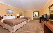 Bedroom 4 Executive Plus Inn and Suites (ex Americas Best Value Inn Elk City)