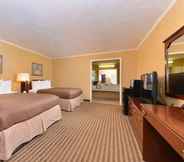 Bedroom 4 Executive Plus Inn and Suites (ex Americas Best Value Inn Elk City)