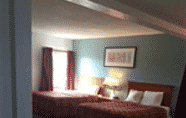 Bedroom 5 Rodeway Inn And Suites