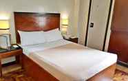 Bedroom 6 Royale Parc Inn & Suites
