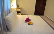 Phòng ngủ 7 Pravina Hotel
