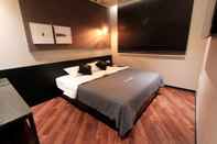 Kamar Tidur Brown Dot Hotel Beom il