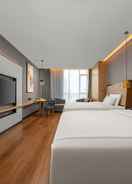 精选亲子房 Ginza Jiayue Select Hotel (Qihe Wanda Plaza Spring City Oulebao)