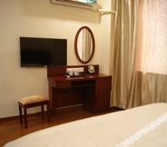Bedroom 5 GreenTree Inn Shanghai PuDong New District YangSi Metro Station YangXin Road Shell Hotel