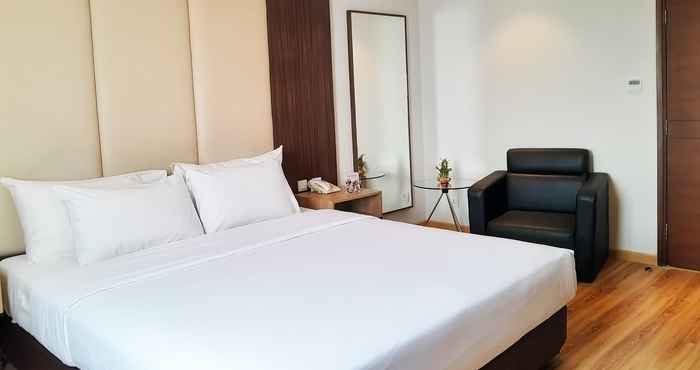 Kamar Tidur Hotel Orchardz Bandara