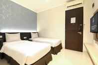 ห้องนอน Hotel 88 Embong Kenongo (Kayoon) By WH