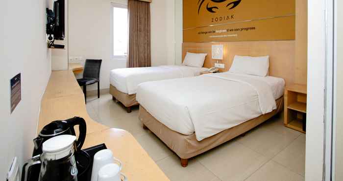 Bedroom Zodiak Asia Afrika by KAGUM Hotels