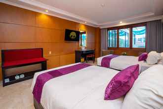 Phòng ngủ 4 Hotel Bumi Senyiur