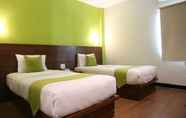 Kamar Tidur 7 Hotel Candi Indah Syariah Powered by Archipelago