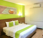 Kamar Tidur 5 Hotel Candi Indah Syariah Powered by Archipelago