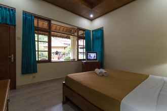 Kamar Tidur 4 Bali Sandy Resort