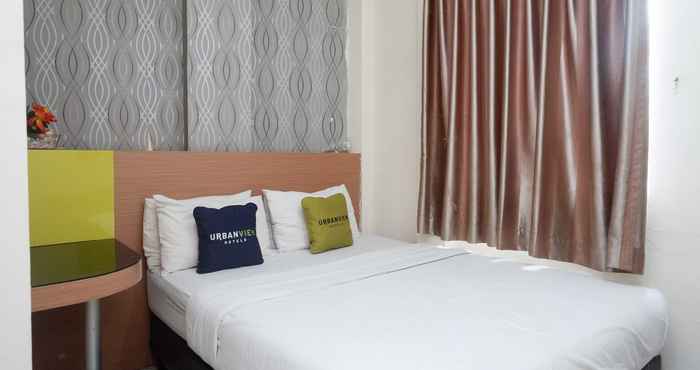 Bedroom Urbanview Hotel Capital Makassar