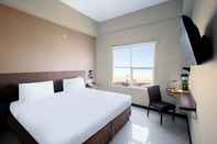 ห้องนอน Tree Hotel Panakkukang Makassar by LIFE