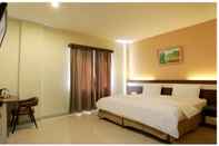 ห้องนอน Guest Hotel Manggar