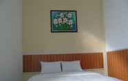 Bedroom 6 Permata Zamrud Hotel
