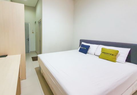 寝室 Urbanview Hotel Pondok Mas Cirebon By RedDoorz