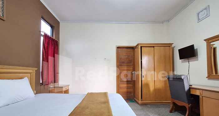 Bedroom Hotel Graha Muslim RedPartner