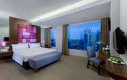 Bedroom 6 Quest Hotel Darmo - Surabaya by ASTON