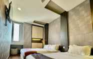 Bedroom 6 Chariton Hotel Nusa Bestari