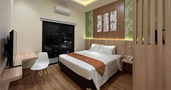 Bedroom D'Bamboo Suites