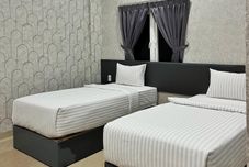 寝室 Cemara Asri Inn