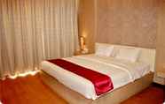 Kamar Tidur 4 Sutan Raja Hotel & Convention Centre Amurang