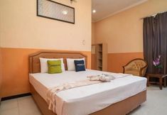 寝室 2 Urbanview Hotel de Kopen Malang by RedDoorz