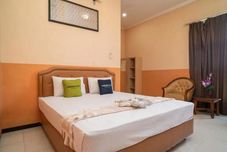 寝室 Urbanview Hotel de Kopen Malang by RedDoorz