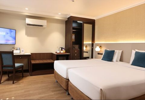 Bedroom City Garden Suites Hotel