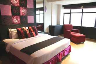 Kamar Tidur 4 Grand Inn Hotel