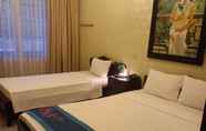 Kamar Tidur 6 Lucky Central Hotel & Travel