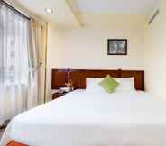 Phòng ngủ 3 Lucasta Saigon Hotel