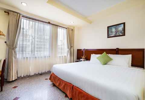 Phòng ngủ Lucasta Saigon Hotel