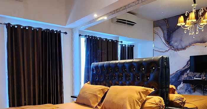 Bilik Tidur Cozy Studio at Orchard Apartment by Miracle