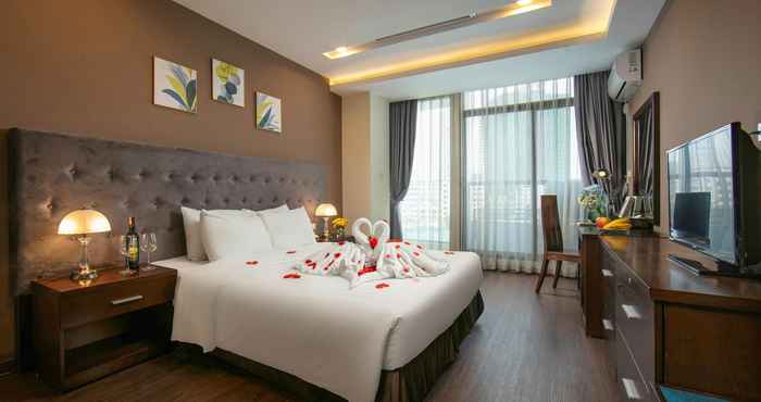 ห้องนอน Brilliant Me Tri Hotel & Spa
