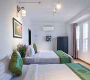 Bedroom 5 Purple Hue - Charming Riverside Hotel