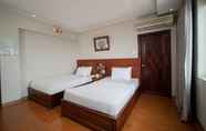 Phòng ngủ 4 Van Ha Hotel