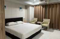 Kamar Tidur Mall Suites Hotel