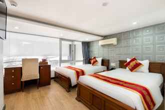 Kamar Tidur 4 King Hotel Saigon Airport