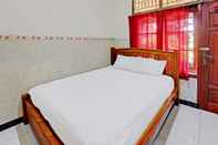 Bedroom OYO 92560 Astri Homestay