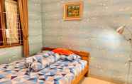 Bedroom 3 3BR Family Villa near Museum Angkut in Batu City at Villa Kusuma Estate 42