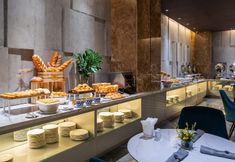 레스토랑 4 Acnos Hotel