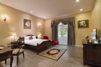 Phòng ngủ Hidden Mansions SaiGon Resort