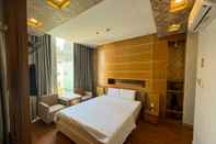 Kamar Tidur Lucky Star Hotel Q5